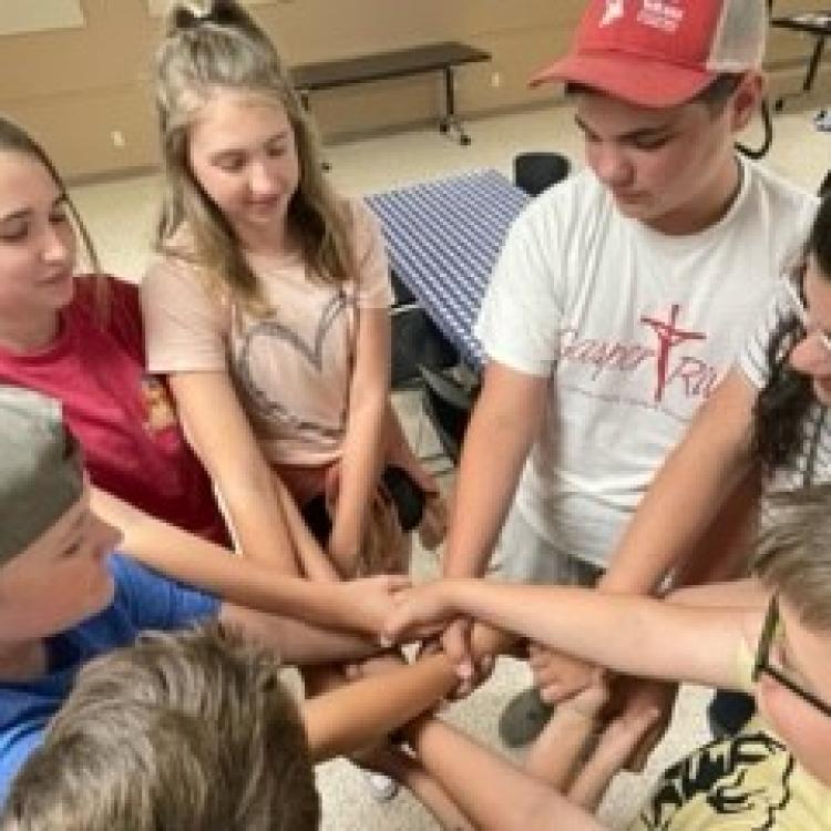 Homeschool members playing the Knot game